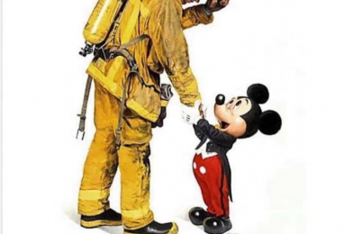 Firefighter from Iconic “Mickey and the Fireman” Portrait Hospitalized Due To COVID-19