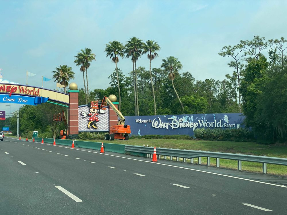 PHOTOS: EPCOT/World Center Drive Entrance Archway Repainting Begins for ...