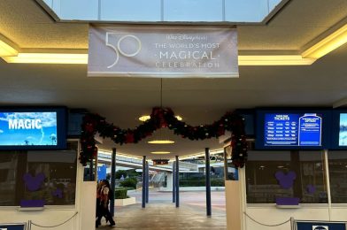 Holiday Decorations Added to Tomorrowland Speedway, Main Street Confectionery Windows, and More at Magic Kingdom
